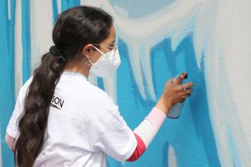 Chantiers loisirs jeunes avec la réalisation de la fresque murale sur le quartier de Veyrieres. 